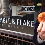 Infobox_pdx_allisonejones_crumbleflake_exterior_woman_croissant